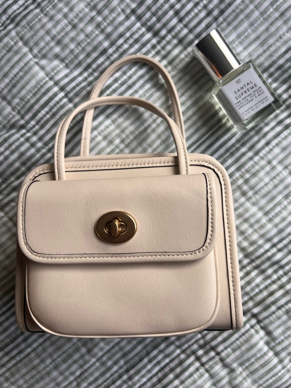 Coach Turn-lock Mini Bag